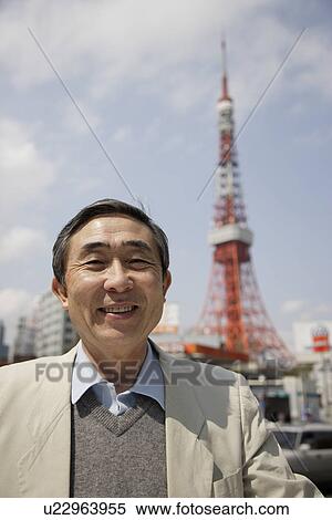 Portrait of a businessman smiling View Large Photo Image Stock Photography - Portrait of a businessman smiling. Fotosearch