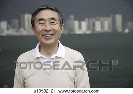 Portrait of a senior man smiling View Large Photo Image Stock Image - Portrait of a senior man smiling. Fotosearch