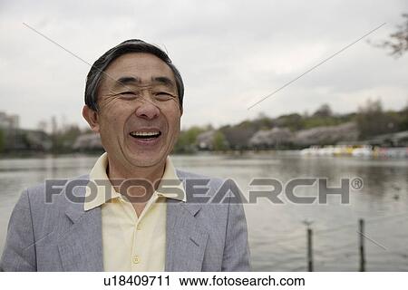 Stock Image - Portrait of a smiling senior man. Fotosearch