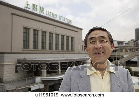 Stock Photo - Portrait of a smiling senior man. Fotosearch