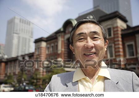 Stock Photograph - Portrait of a smiling senior man. Fotosearch