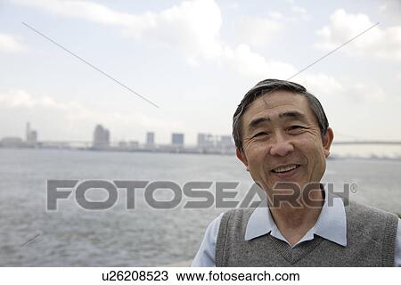 Stock Image - Portrait of senior man smiling. Fotosearch