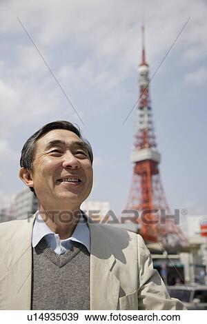 Stock Photo - View of a businessman smiling. Fotosearch