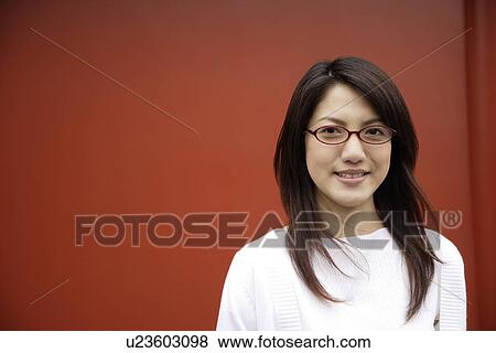 Stock Photo - Portrait of a young woman. Fotosearch