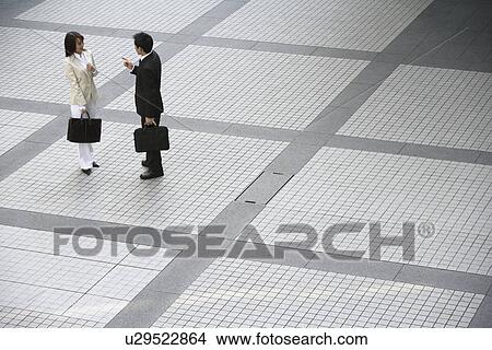 Picture - View of two professionals. Fotosearch