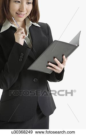 Cropped view of a cheerful executive with a file View Large Photo Image Stock Photo - Cropped view of a cheerful executive with a file. Fotosearch