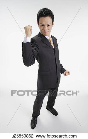 Man posing for the camera, portrait View Large Photo Image Stock Image - Man posing for the camera, portrait. Fotosearch