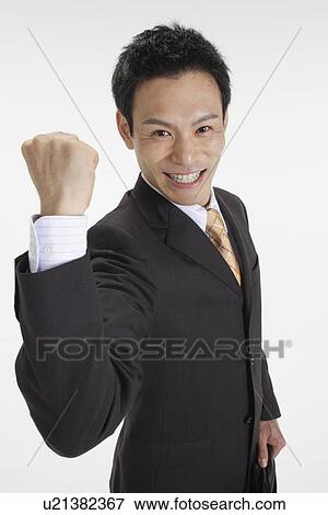 Stock Photo - Man posing for the camera, portrait. Fotosearch