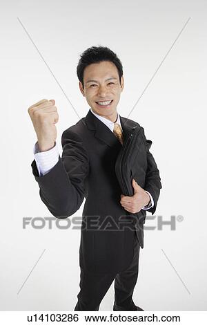 Man posing for the camera, portrait View Large Photo Image Stock Photograph - Man posing for the camera, portrait. Fotosearch
