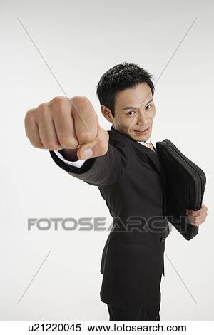 Stock Photography - Man posing for the camera, portrait. Fotosearch