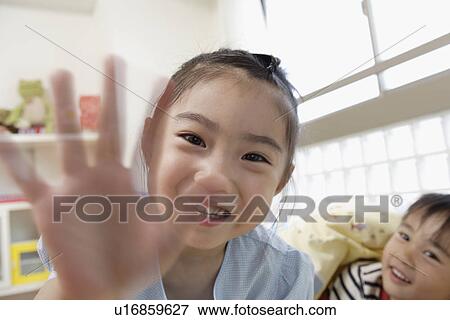 Sisters in bedroom View Large Photo Image Stock Photo - Sisters in bedroom. Fotosearch