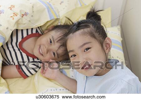 Sisters in bedroom View Large Photo Image Stock Photography - Sisters in bedroom. Fotosearch