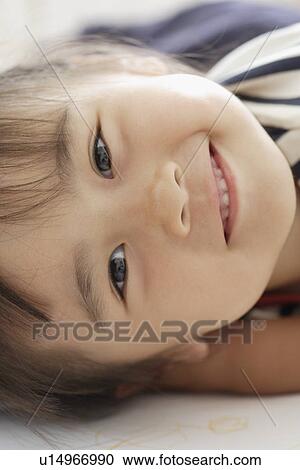 Stock Image - Smiling girl. Fotosearch