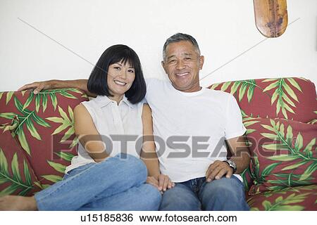 Stock Photograph - Portrait of a couple smiling. Fotosearch