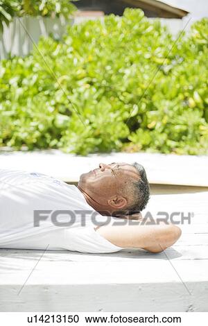 Stock Image - Mature man sleeping. Fotosearch