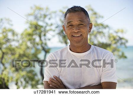 Stock Image - Mature man smiling. Fotosearch