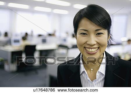 Stock Photograph - A woman showing her overwhelming emotion in front of the camera. Fotosearch