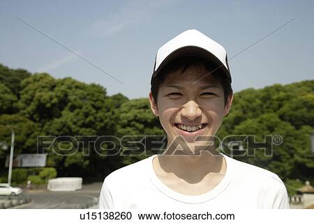 Portrait of a young man smiling View Large Photo Image Stock Image - Portrait of a young man smiling. Fotosearch