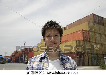 Stock Image - Portrait of a young man. Fotosearch
