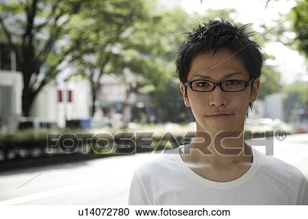 Stock Image - Portrait of a young man. Fotosearch