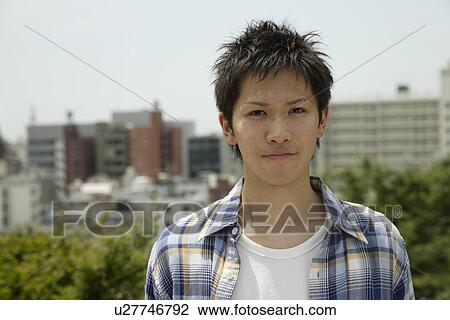 Stock Image - Portrait of a young man. Fotosearch