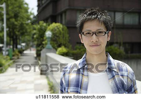 Portrait of a young man View Large Photo Image Stock Photo - Portrait of a young man. Fotosearch