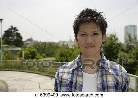 Stock Photo - Portrait of a young man. Fotosearch