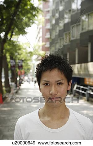 Portrait of a young man View Large Photo Image Stock Photo - Portrait of a young man. Fotosearch