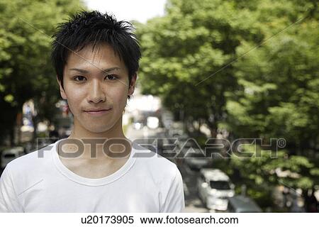 Portrait of a young man View Large Photo Image Stock Photography - Portrait of a young man. Fotosearch