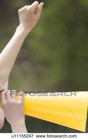 High School Student Cheering with Megaphone View Large Photo Image Stock Photo - High School Student Cheering with Megaphone. Fotosearch