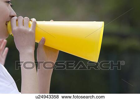 High School Student Cheering with Megaphone View Large Photo Image Stock Photo - High School Student Cheering with Megaphone. Fotosearch