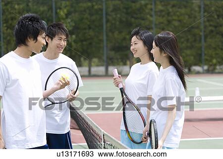 High School Students on Tennis Court with Holding Tennis Rackets View Large Photo Image Stock Image - High School Students on Tennis Court with Holding Tennis Rackets. Fotosearch