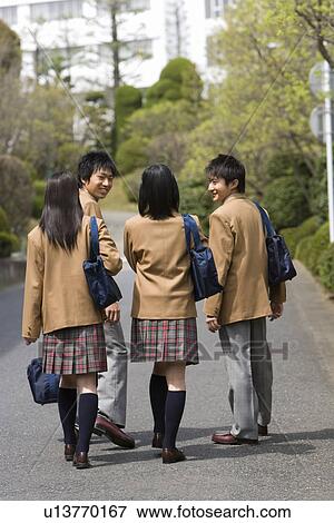 Stock Photo - High School Students Walking on Street Together. Fotosearch