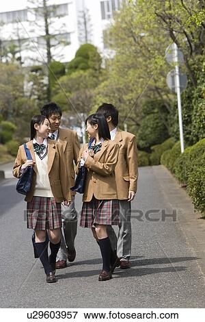 High School Students Walking on Street Together View Large Photo Image Stock Photo - High School Students Walking on Street Together. Fotosearch