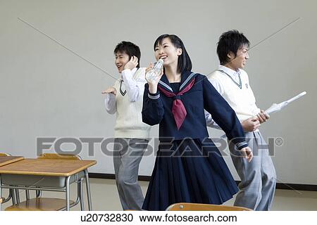 Three high school students practicing stage performance View Large Photo Image Stock Image - Three high school students practicing stage performance. Fotosearch