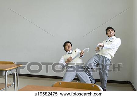 Two high school students practicing stage performance View Large Photo Image Stock Photography - Two high school students practicing stage performance. Fotosearch
