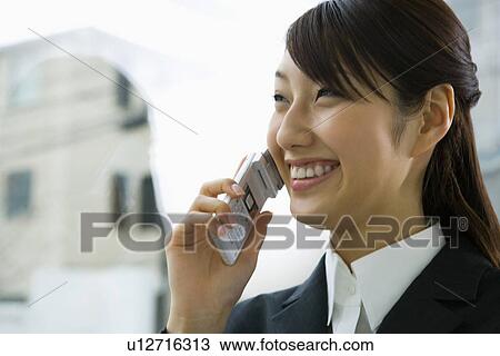 Businesswoman on a Mobile Phone, Head and Shoulder, Side View View Large Photo Image Stock Image - Businesswoman on a Mobile Phone, Head and Shoulder, Side View. Fotosearch