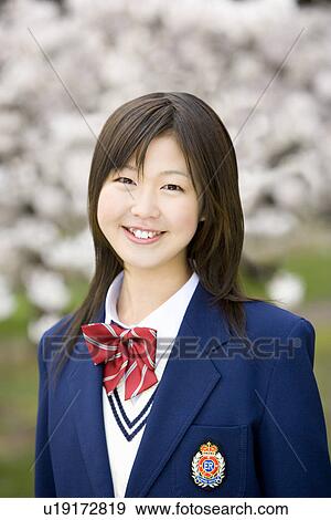 Stock Photo - High School Students Taking Pictures of Themselves with Mobile Phone. Fotosearch