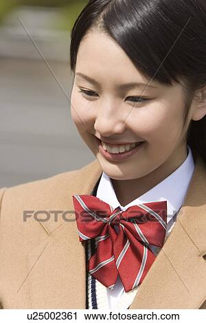 Stock Image - High School Girl Smiling. Fotosearch