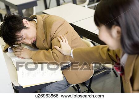 High School Girl Waking Friend Up, Selective Focus View Large Photo Image Stock Photograph - High School Girl Waking Friend Up, Selective Focus. Fotosearch