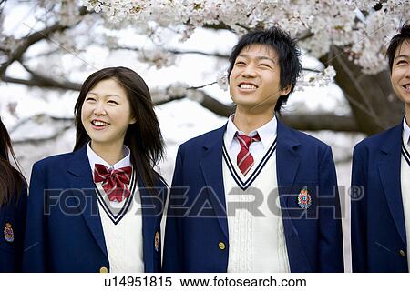 High School Student Standing in Front of Cherry Blossoms View Large Photo Image Stock Photography - High School Student Standing in Front of Cherry Blossoms. Fotosearch