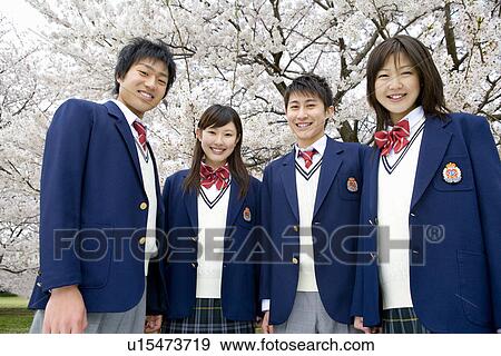 High School Student with Cherry Blossoms in the Background View Large Photo Image Stock Photo - High School Student with Cherry Blossoms in the Background. Fotosearch