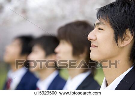 Stock Image - High School Students in a Row, Differential Focus. Fotosearch