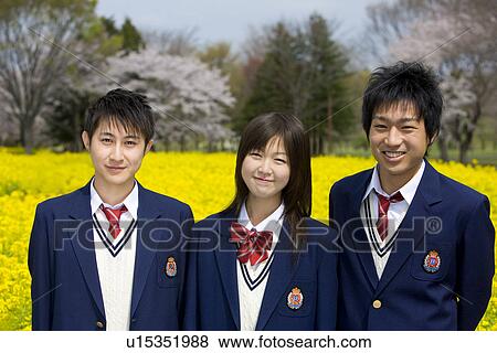 Stock Photo - High School Students In Rape Seed Blossoms. Fotosearch