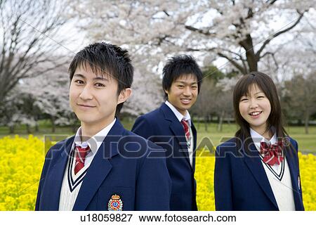 Stock Photo - High School Students In Rape Seed Blossoms. Fotosearch