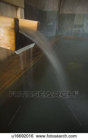 Hot water running out from a wooden tap, hot spring, side view, close up, long exposure, Japan View Large Photo Image Stock Photograph - Hot water running out from a wooden tap, hot spring, side view, close up, long exposure, Japan. Fotosearch