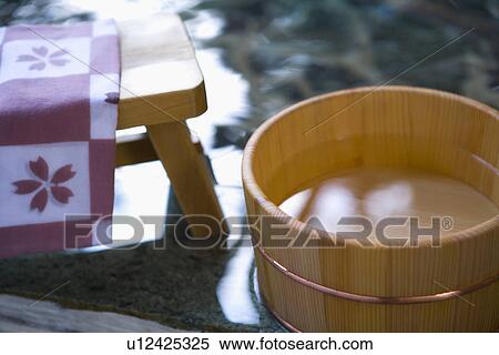 Wooden tub and towel on wooden chair, hot spring, high angle view, close up, Japan View Large Photo Image Stock Photography - Wooden tub and towel on wooden chair, hot spring, high angle view, close up, Japan. Fotosearch