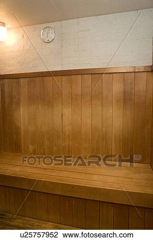 Stock Image - Wooden Bench in a Sauna. Fotosearch