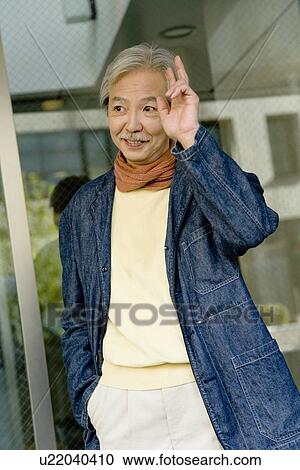 A Mature Man Greeting with a Raised Hand, Front View, Waist Up View Large Photo Image Stock Image - A Mature Man Greeting with a Raised Hand, Front View, Waist Up. Fotosearch