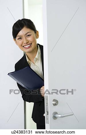 Businesswoman Coming Into a Room, Waist Up, Front View View Large Photo Image Stock Image - Businesswoman Coming Into a Room, Waist Up, Front View. Fotosearch